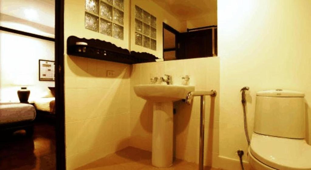 Cucumber Inn Suite Pattaya Værelse billede